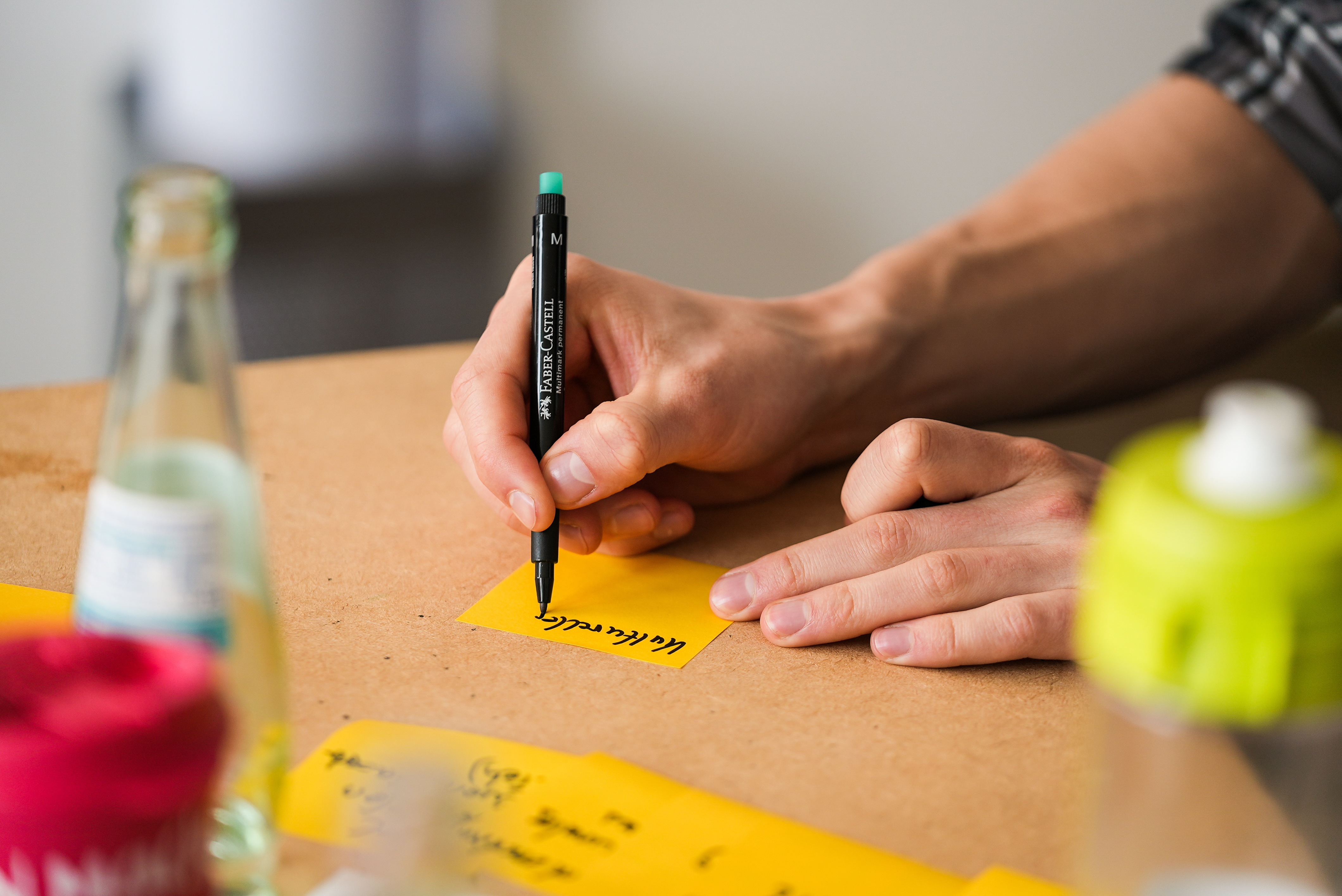 Eine Hand, die "Kulturwandel" aufschreibt